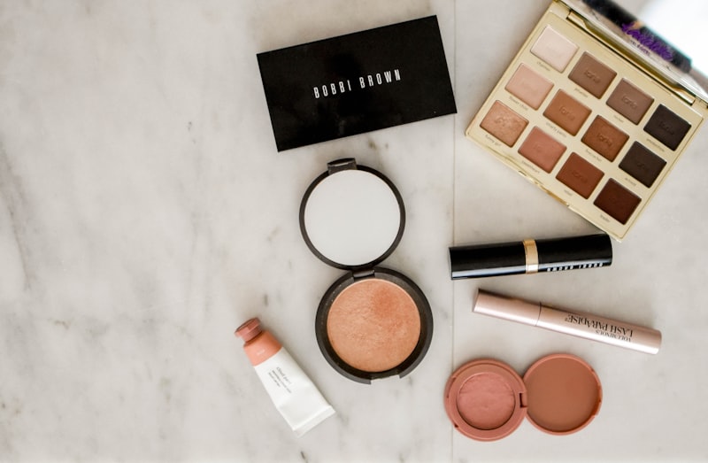 Beauty products styled on marble surface